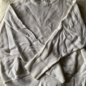 White knitted sweater